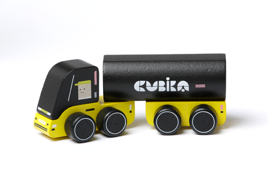 Toy truck with black tanker and yellow base on a white background
