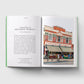 Open book showing a page with text and an illustration of Tooting Market.