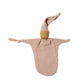 Pink baby swaddle with a small head on a white background