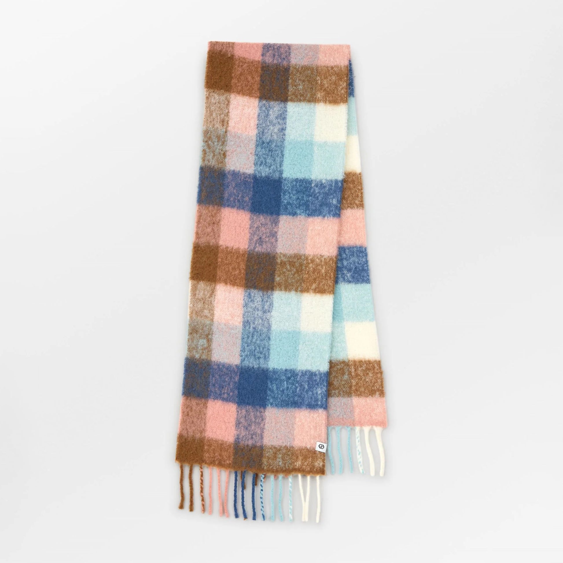 Plaid scarf with fringes on a white background