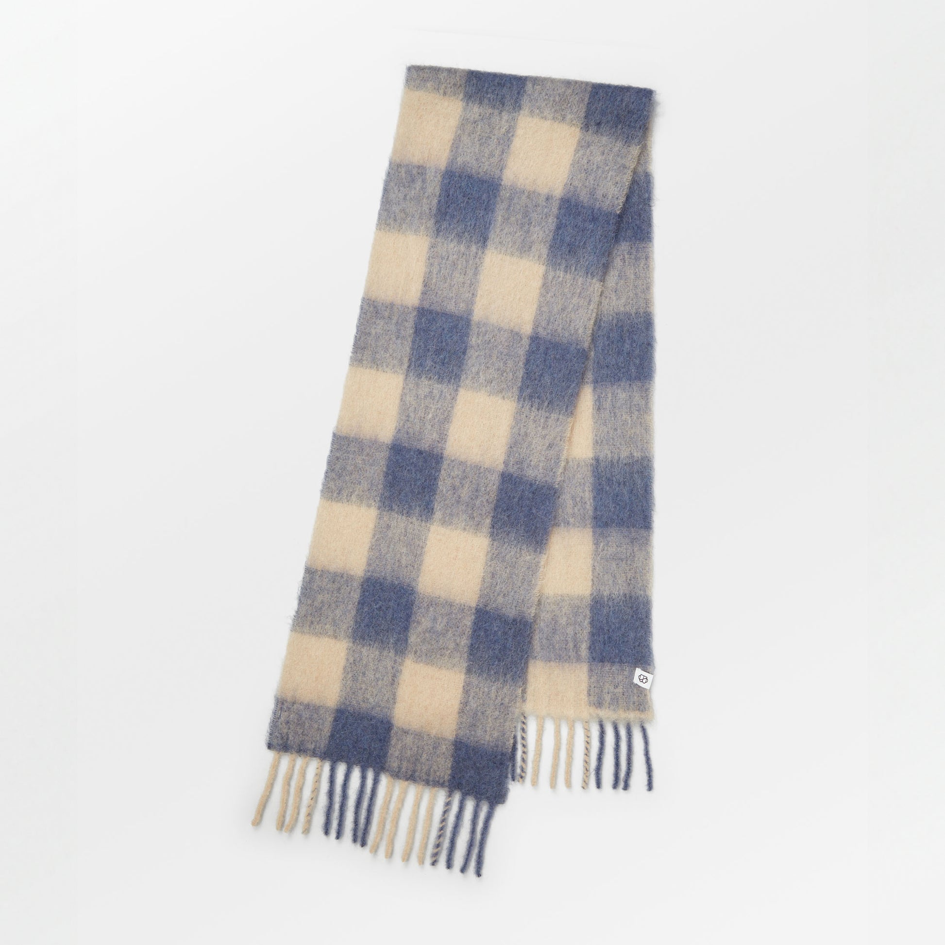 Becksöndergaard Coronet Blue Check Mincho Scarf in autumn colours, made from luxurious Italian wool with a classic checkered pattern.