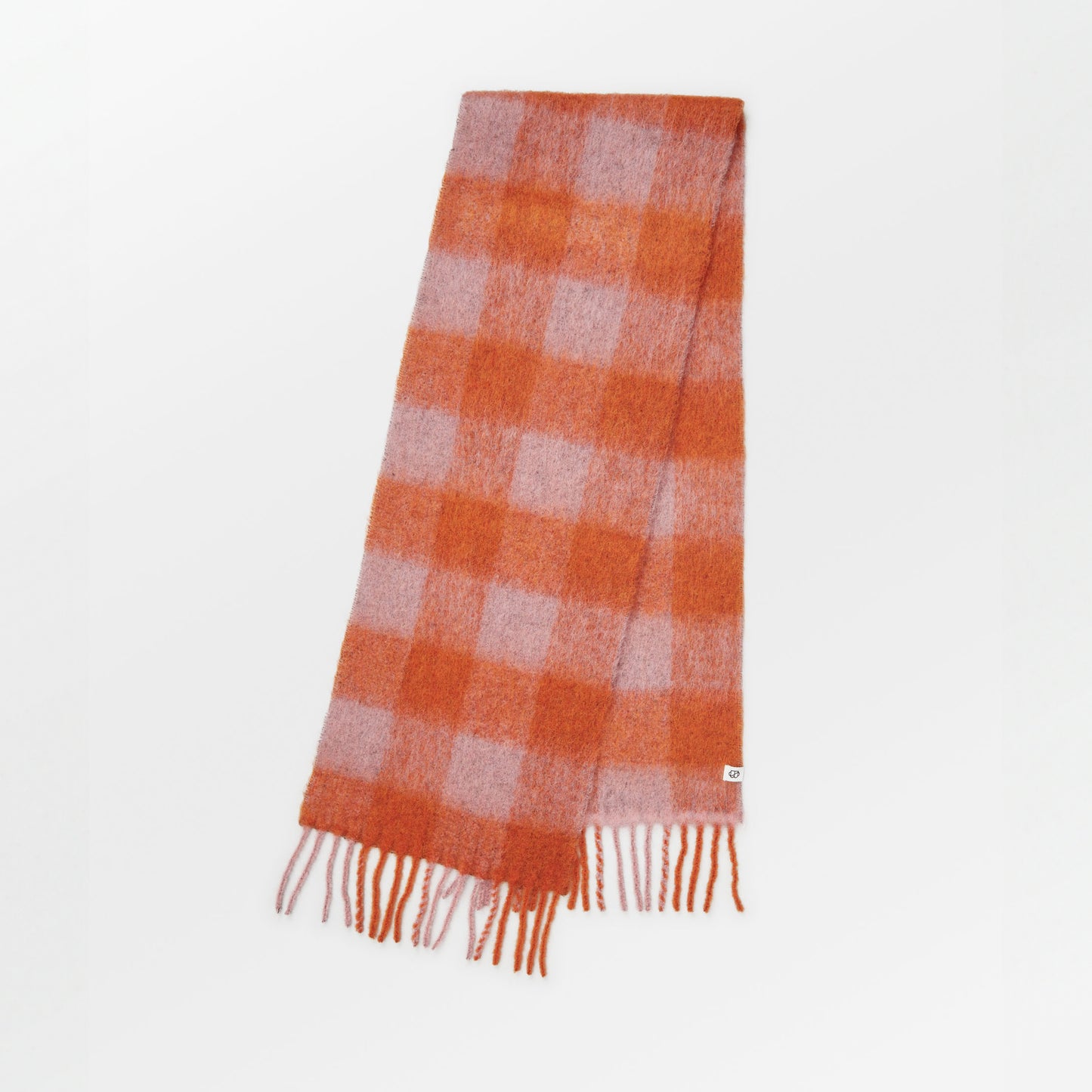 Becksöndergaard Orange Check Mincho Scarf showcasing a classic checkered pattern in vibrant orange and earthy tones, crafted from luxurious Italian wool, elegantly displayed on a neutral background.