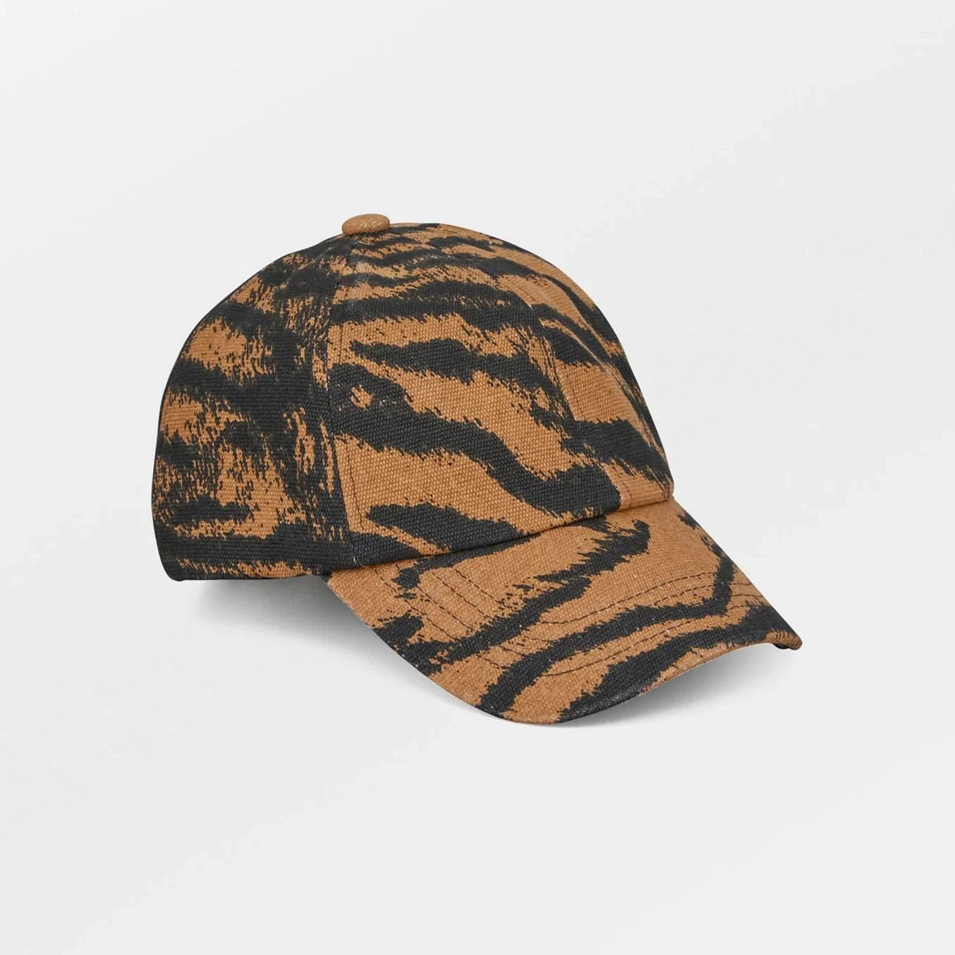 Tiger striped cap on a light gray background