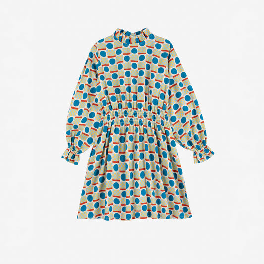 Polka dot dress with long sleeves on a white background