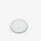 Round white object on a white background