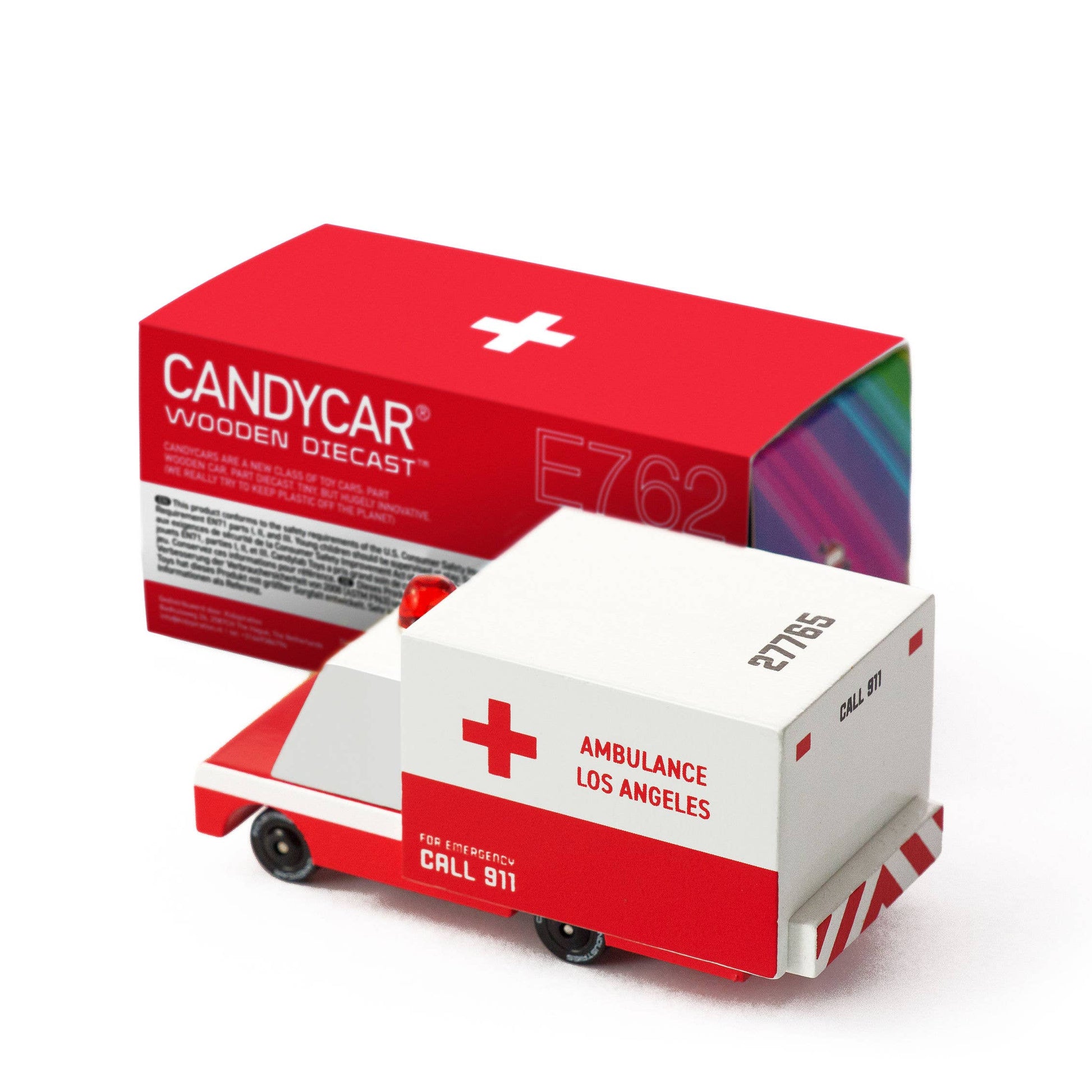 Model ambulance toy with 'Candycar' packaging on a white background