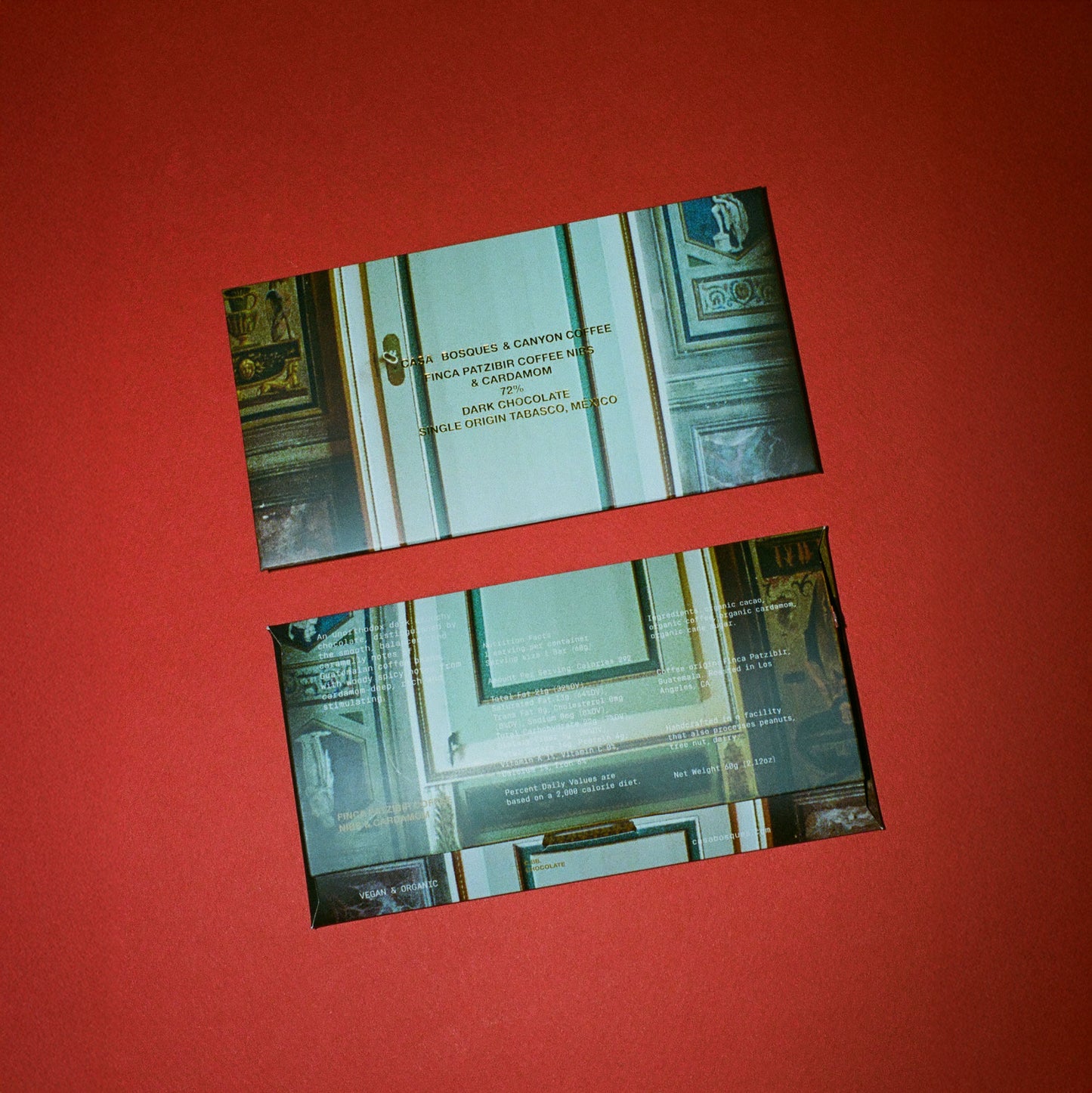 Two packaged chocolate bars with text and images on a red background