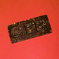 Chocolate bar with 'CBB' branding on a red background