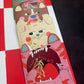 Colorful birthday card with cartoon characters on a red background