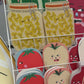 Display of colorful face cards with cartoon designs on a white rack.