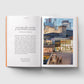 Open book showing text and an image of a building with 'Hayward Gallery' on the cover.