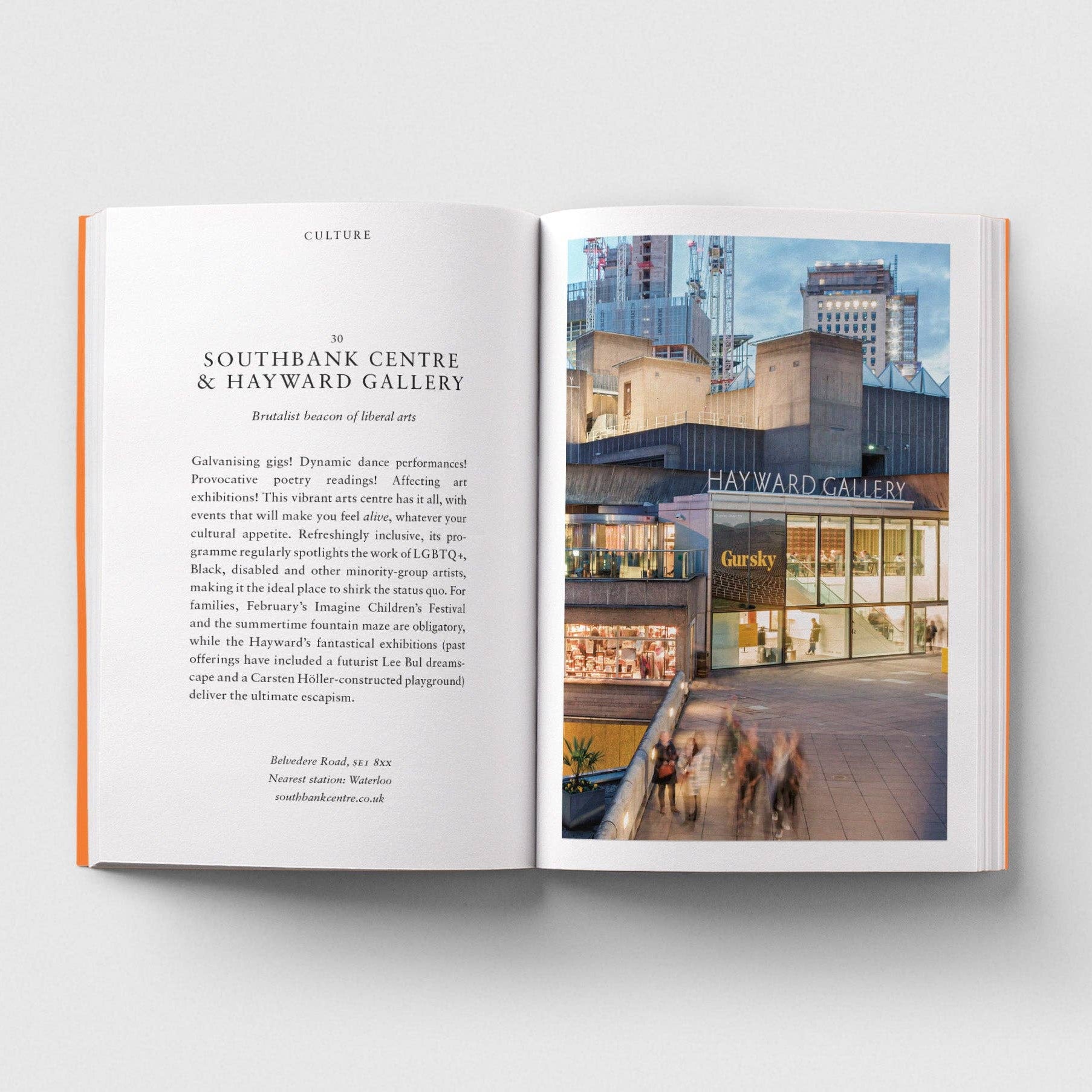 Open book showing text and an image of a building with 'Hayward Gallery' on the cover.