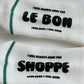 White socks with black text on a white background