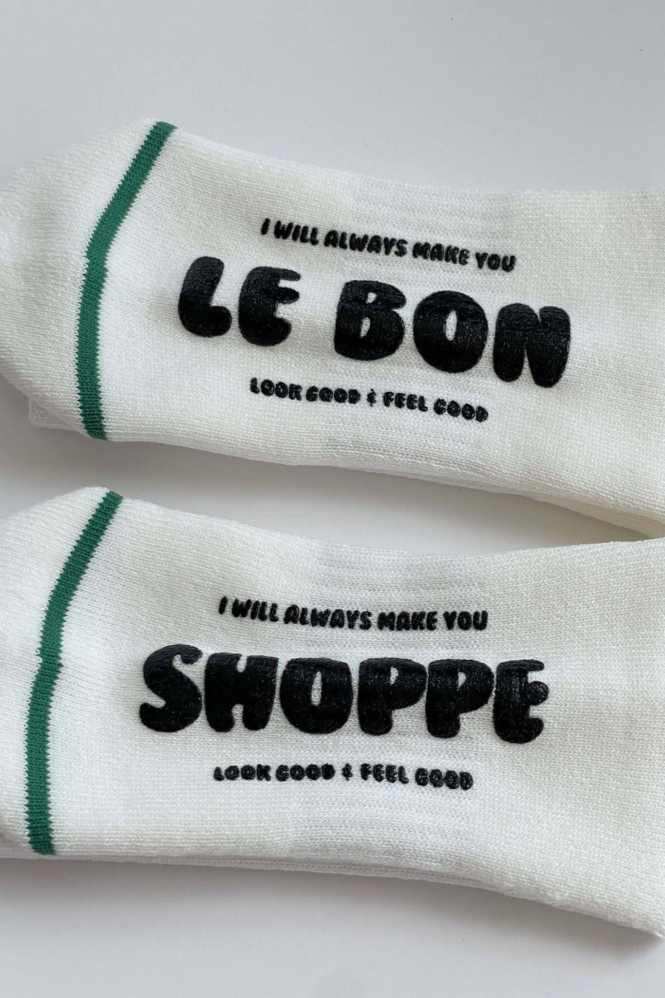 White socks with black text on a white background