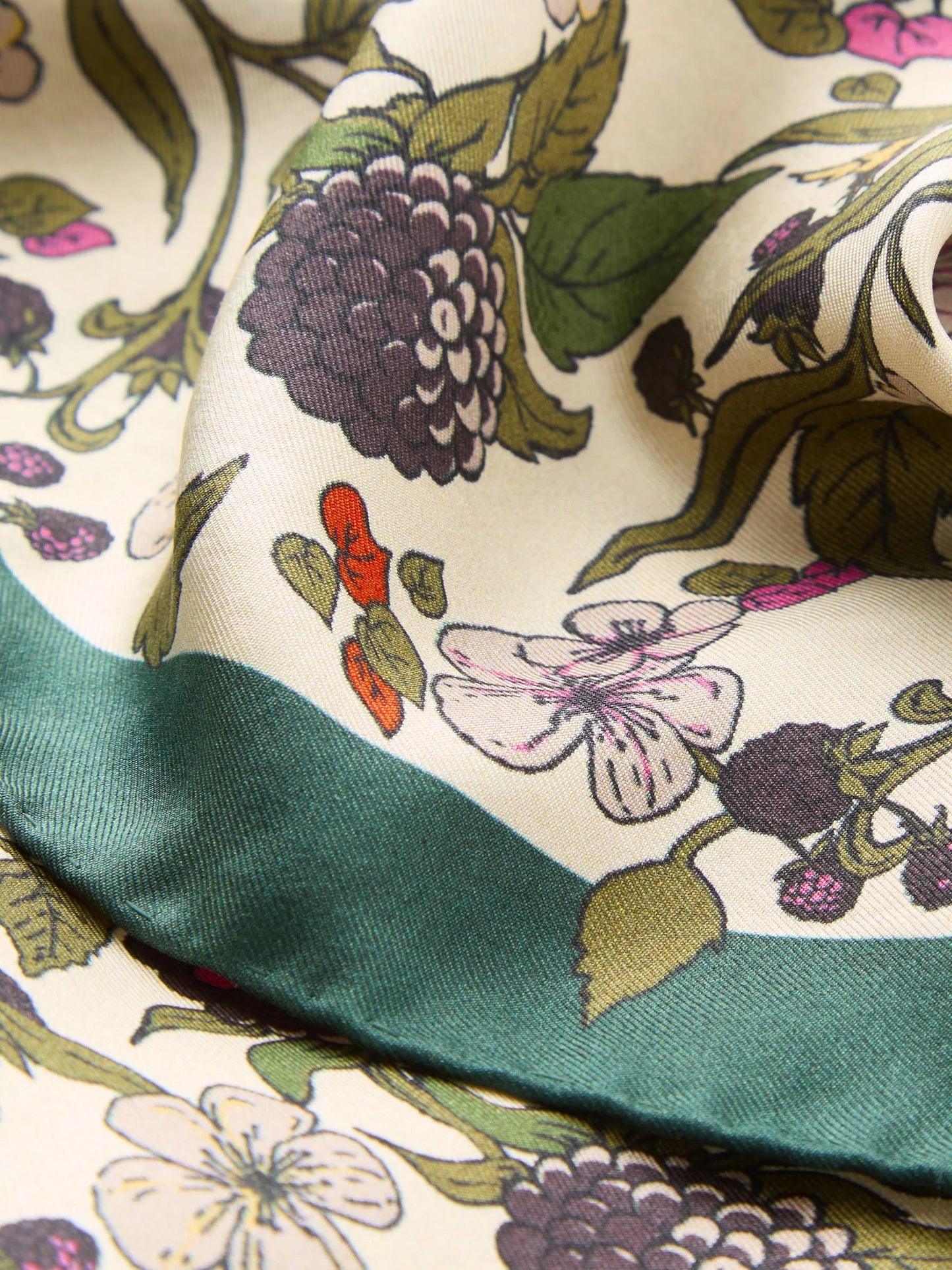 Floral patterned fabric with green border