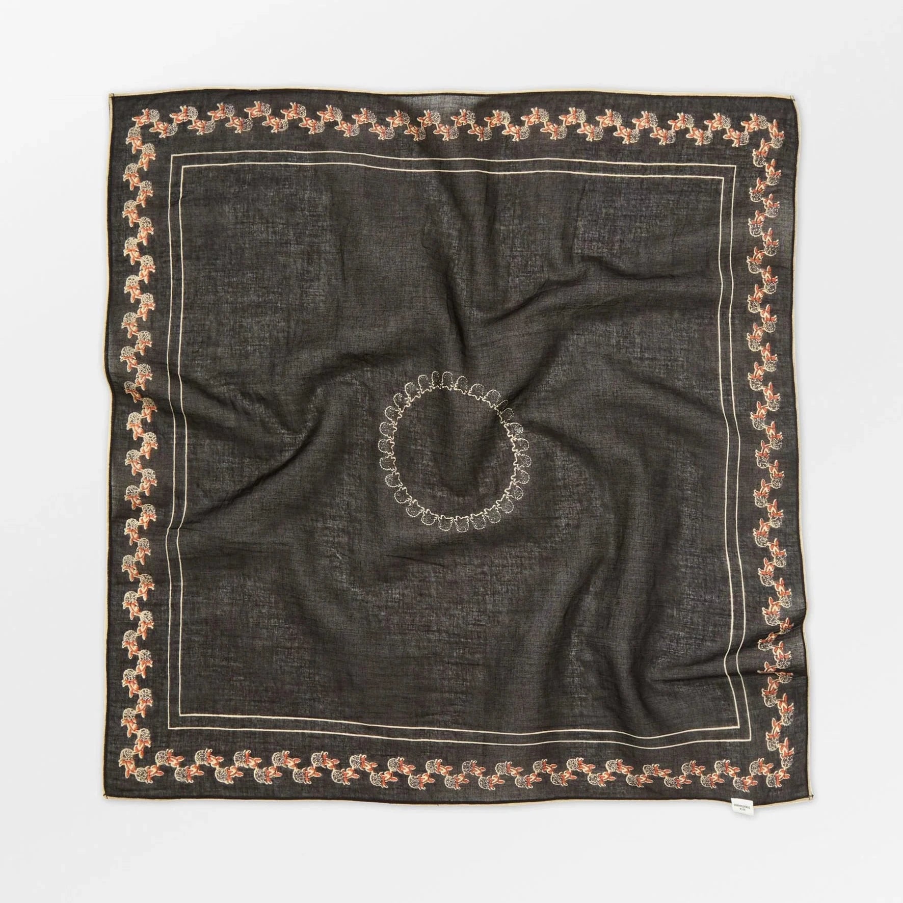 Black square scarf with decorative border on a white background