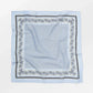 Light blue bandana with black border on a white background