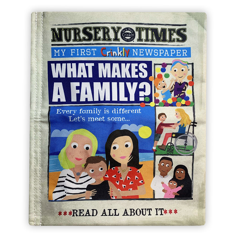 A crinkly cloth book titled Nursery Times: What Makes A Family? Designed to resemble a newspaper, the cover features a bold blue headline with diverse family illustrations, including two mums, a parent in a wheelchair, and a child with a caregiver. The tagline reads, Every family is different—Let’s meet some...