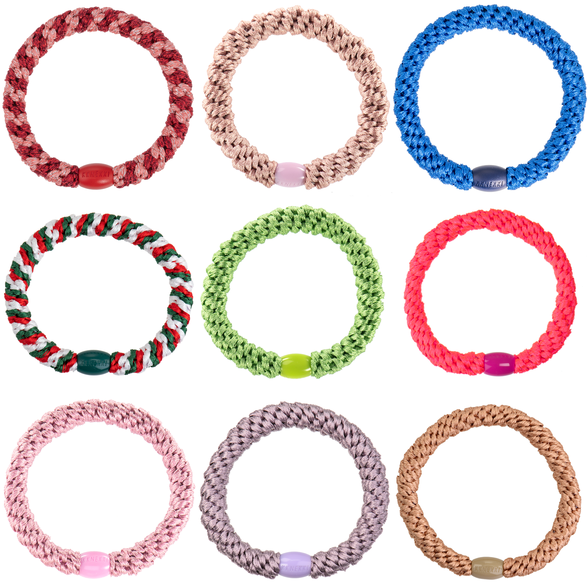 Collection of colorful braided bracelets on a white background