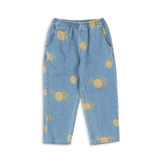 Konges Sløjd Magot Pants in Lemon – relaxed-fit denim trousers featuring an all-over lemon print. Designed with an elasticated waistband for comfort, side pockets, and a slightly tapered leg for a casual yet stylish look