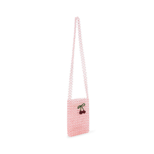 A small, handcrafted beaded bag by Konges Sløjd in a soft pink hue. The design features a long beaded strap and a delicate cherry motif on the front.