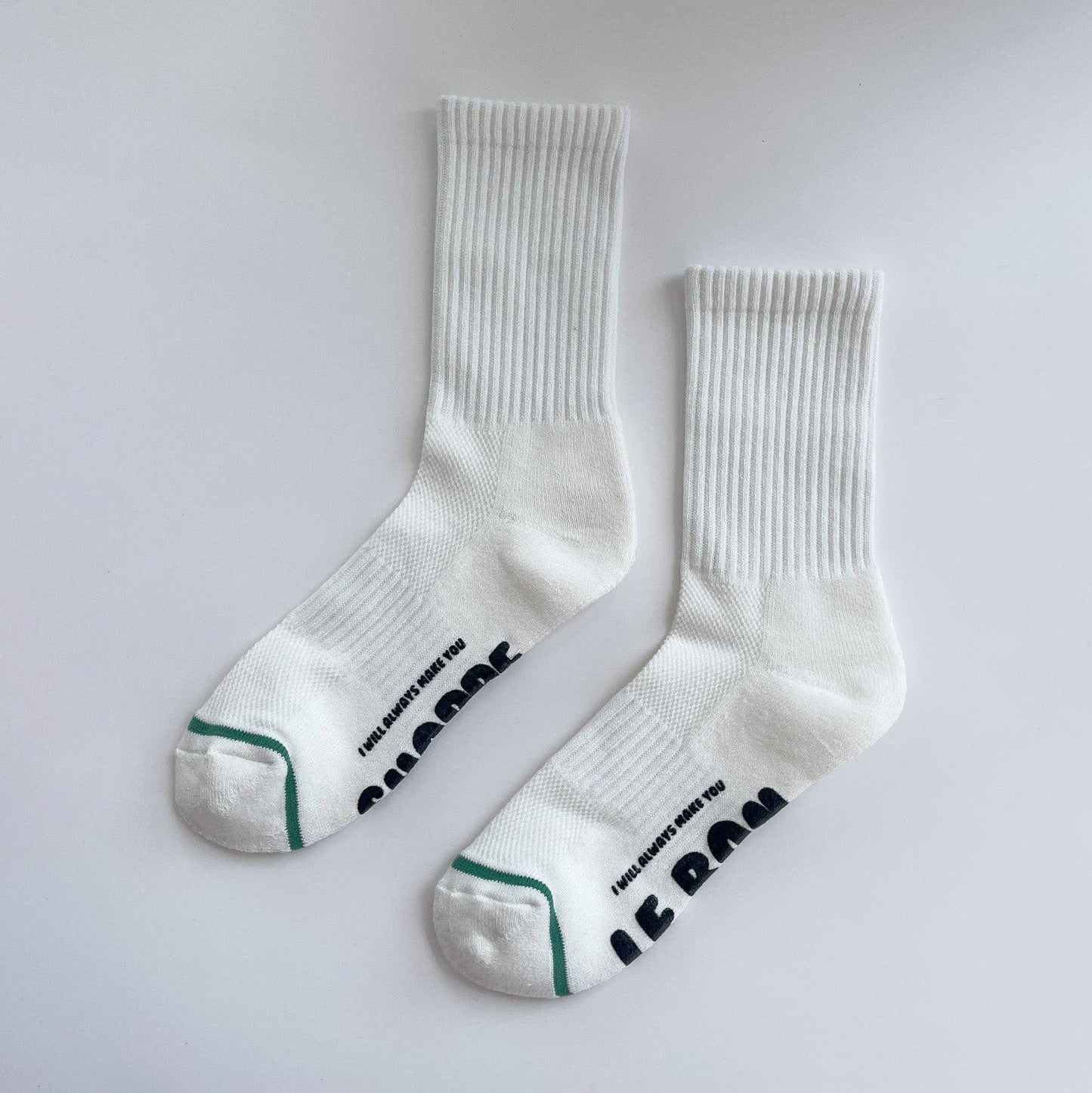 White socks with text on a light gray background