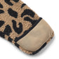 Beige and black leopard print onesie sleeve on a white background
