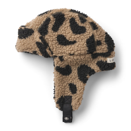 Leopard print fleece hat on a white background
