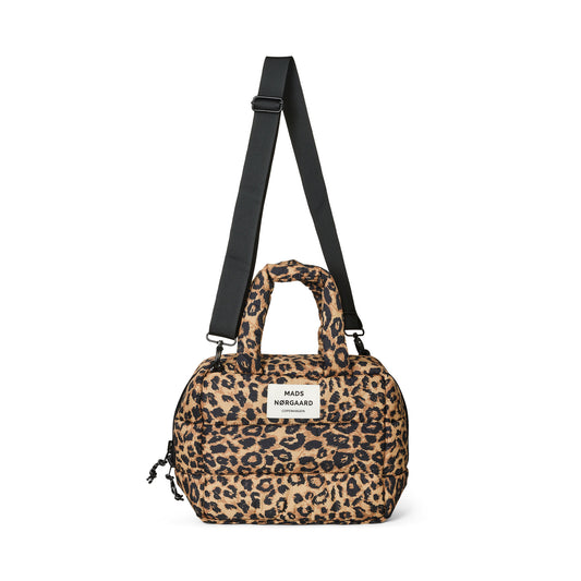Leopard print small bag with a black strap on a white background