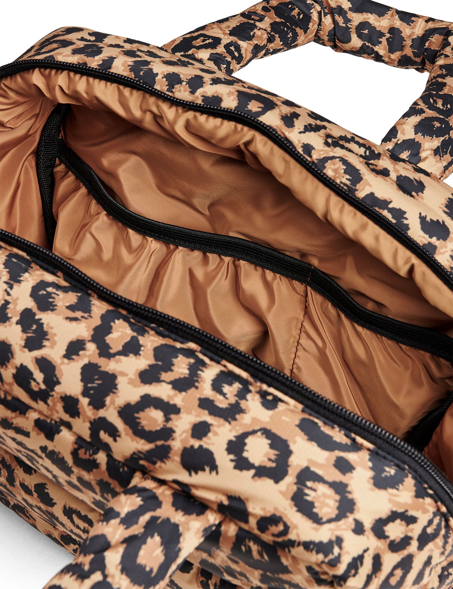 Leopard print bag with open top showing interior.