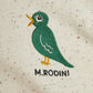 Embroidered green bird design on a textured beige fabric with 'M.Rodini' branding.