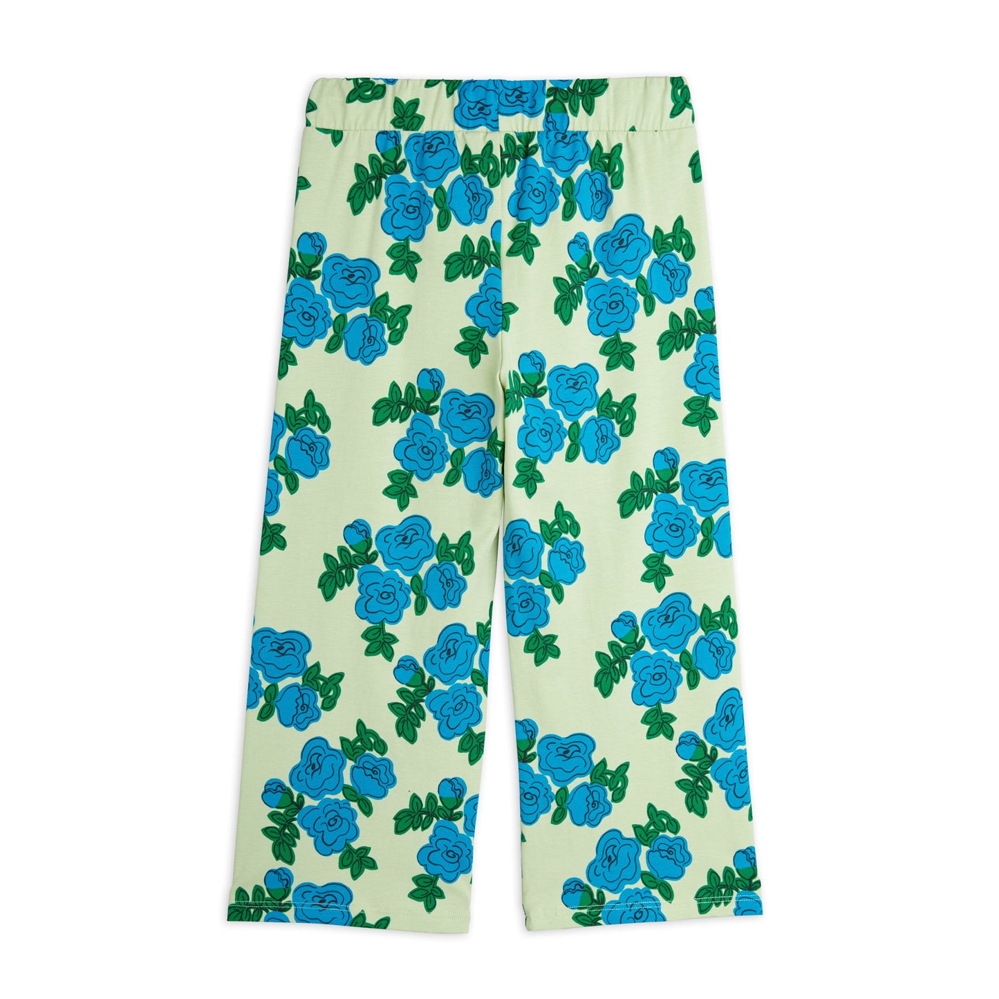 A back view of the wide-leg floral trousers, showcasing the vibrant blue flower print on a light green background.