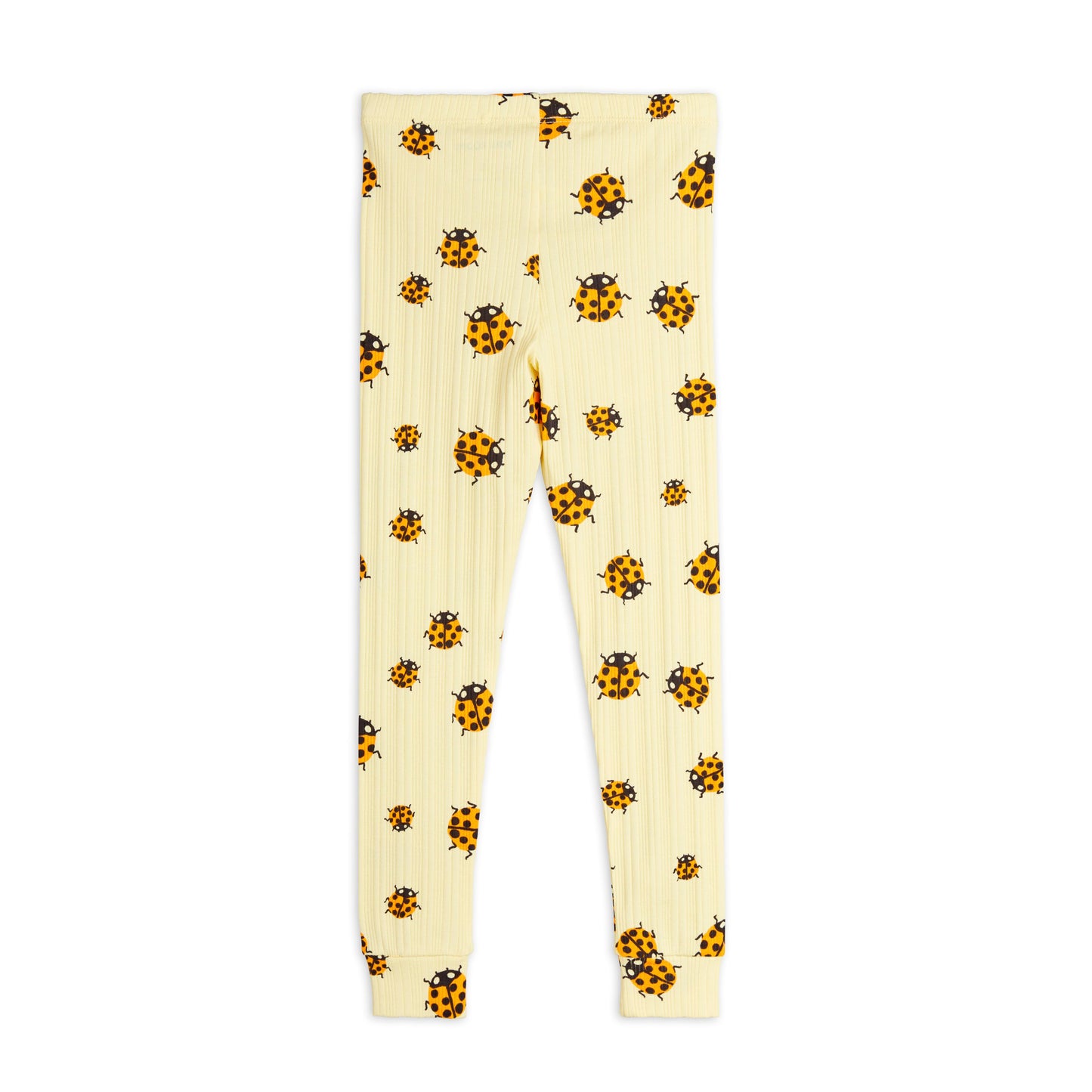 A back view of the cream-coloured ribbed children's leggings, showcasing the all-over ladybird print and elastic waistband.