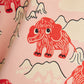 Red elephant illustrations on a pink background with mountains.