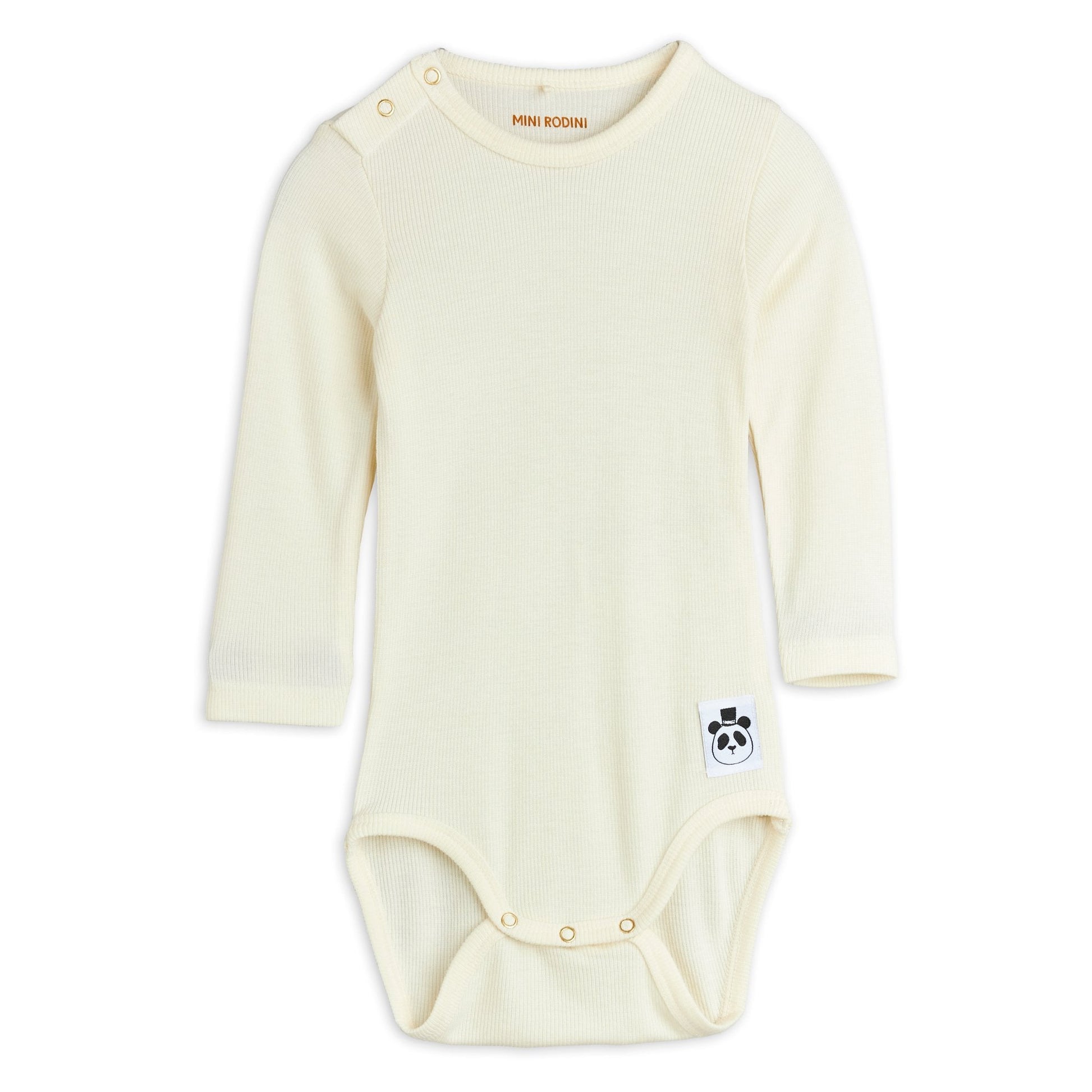 Cream-coloured baby onesie with a small logo on a white background