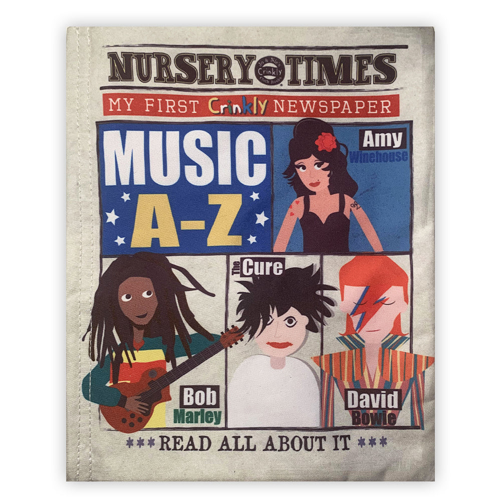 A colourful cloth book designed to look like a crinkly newspaper. The book features six brightly illustrated pages showcasing popular music artists, with crinkly texture and soft fabric. It is presented on a neutral background, emphasizing its lightweight and sensory appeal for babies and toddlers. Shown from the front with artists Amy Winehouse, Bob Marley, The Cure, and David Bowie