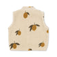 Beige children's vest with lemon pattern on a white background