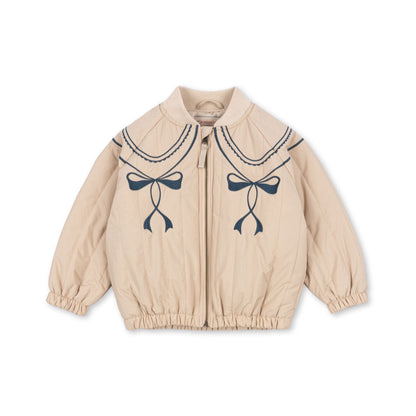 Beige jacket with bow details on a white background