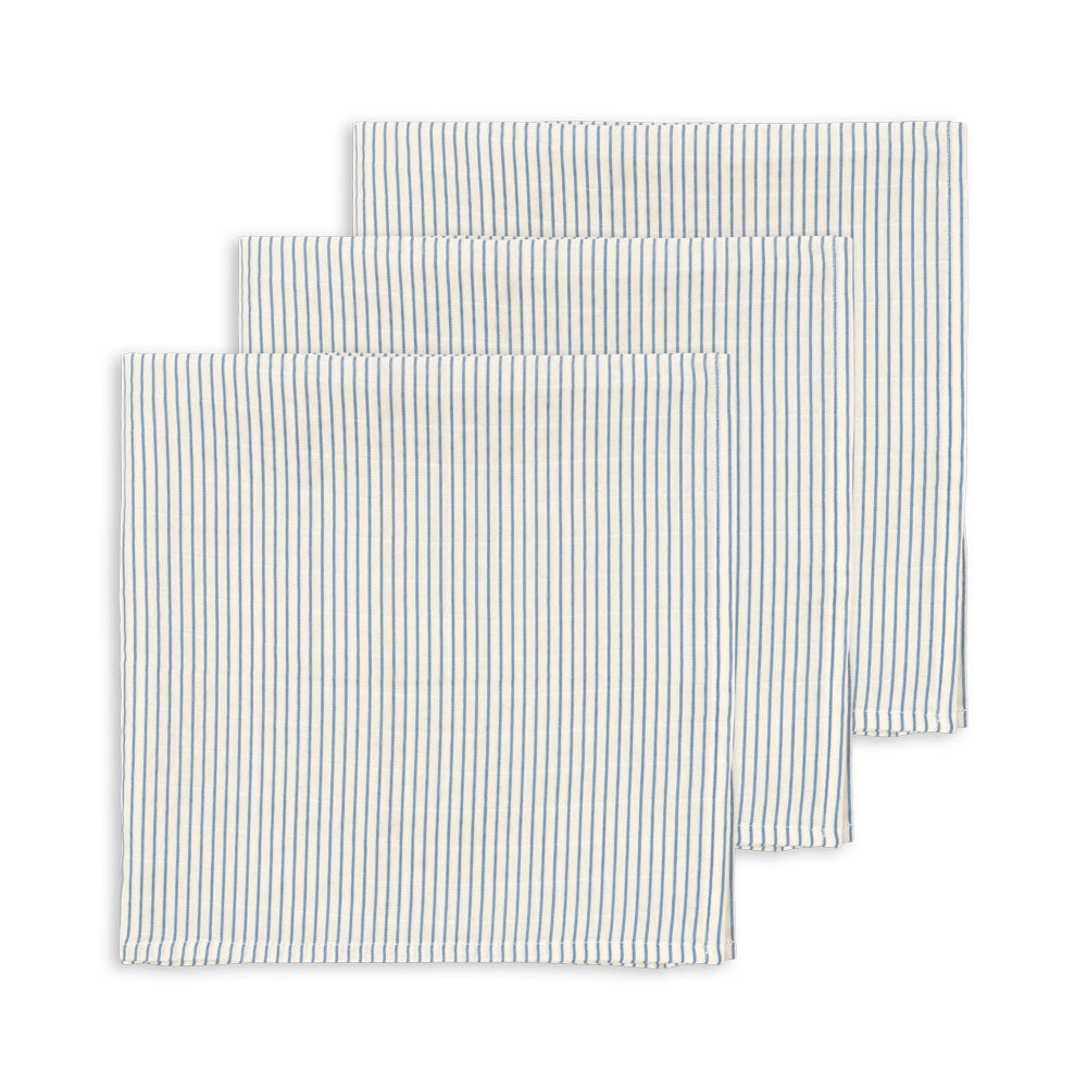 Set of three striped placemats on a white background