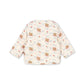 Floral patterned baby jacket on a white background