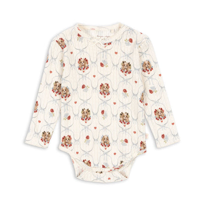 Floral-patterned baby onesie on a white background