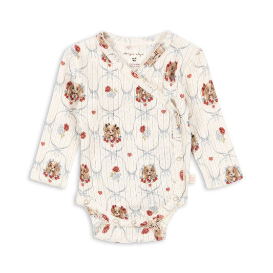Floral-patterned baby bodysuit on a white background