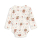 Floral patterned baby romper on a white background