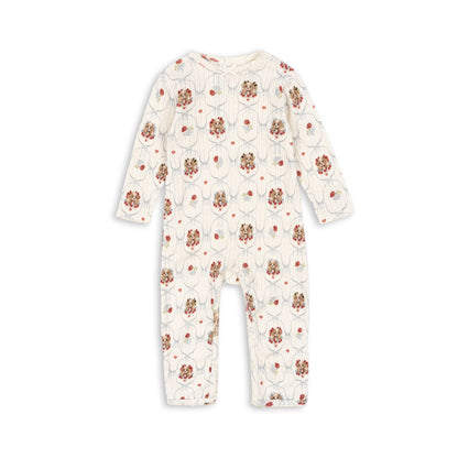 Floral patterned baby onesie on a white background