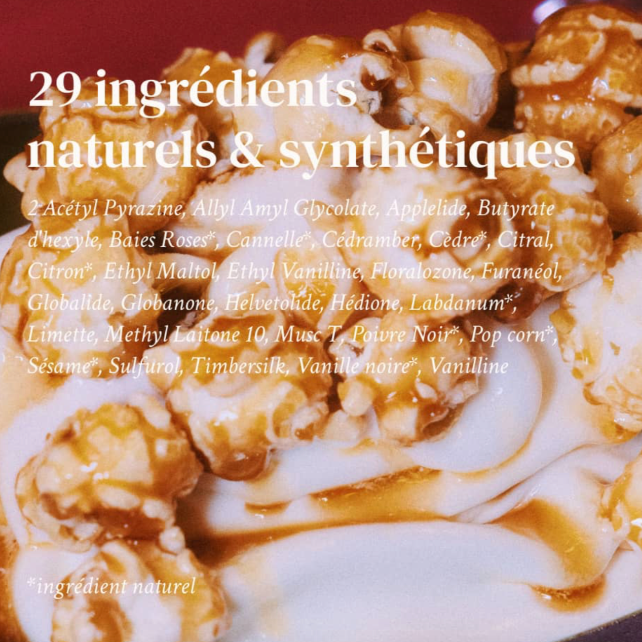 An image of the list of the 29 ingredients that are used to create this perfume, written  in French, against the backdrop of an image of popcorn with golden syrup on it. 