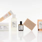Collection of Versante skincare products including a bottle, cream, soap, and cologne on a white background.