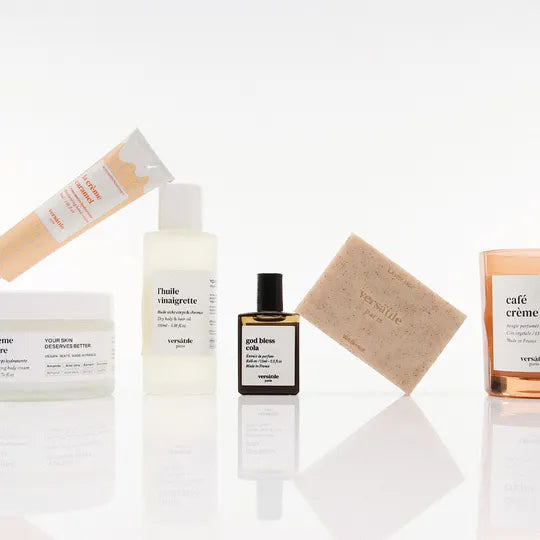 Collection of Versante skincare products including a bottle, cream, soap, and cologne on a white background.