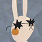 Mr Rabbit art print featuring a stylish white rabbit with rosy cheeks and black star-shaped sunglasses on a blue background, perfect for children's decor.