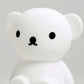 Close up of Boris First Light Lamp, a silicone nightlight designed to look like a teddy bear against a white background.