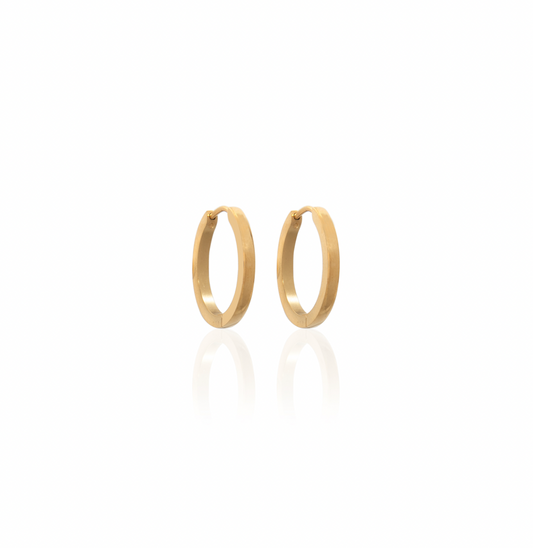 A pair of gold-colored hoop earrings on a white background, crafted from oxidising free stainless steel.